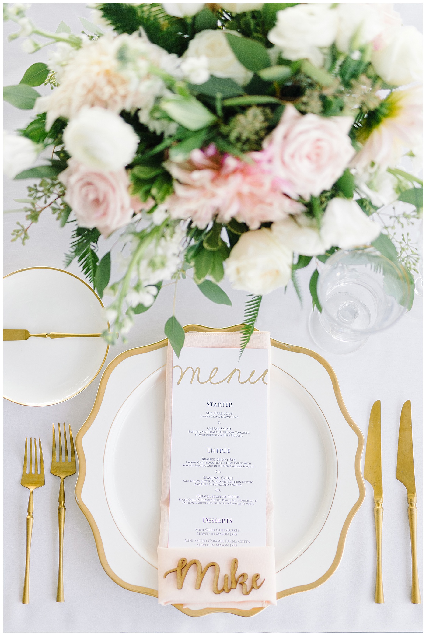 pink, white, and gold wedding reception place setting